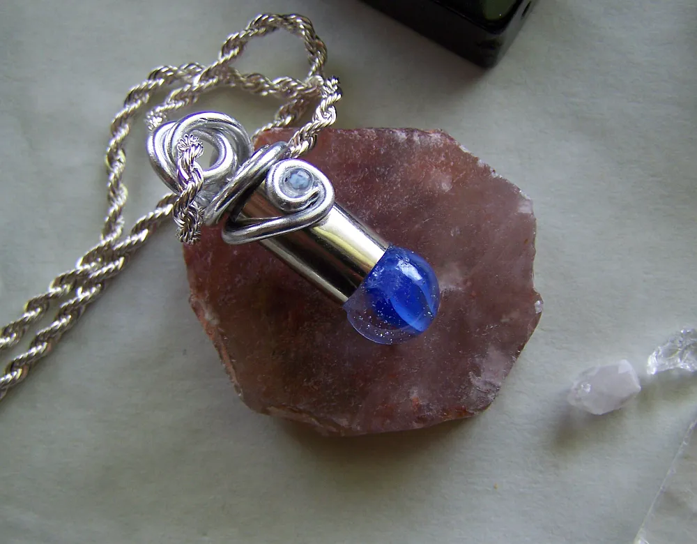 Blue Swirl Cat's Eye Marble Wire Wrapped Silver Bullet Necklace