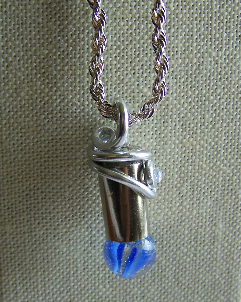 Blue Swirl Cat's Eye Marble Wire Wrapped Silver Bullet Necklace