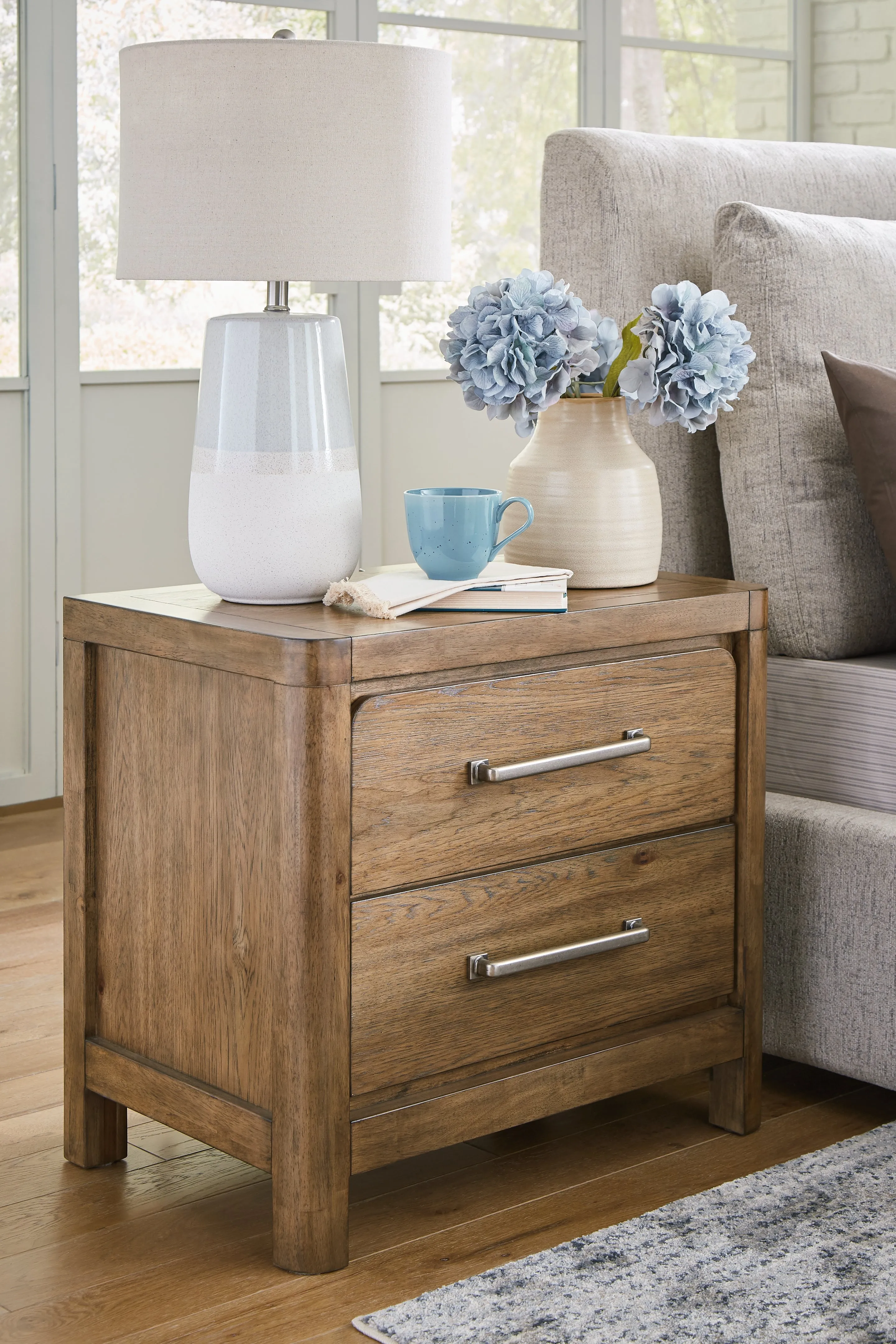 Cabalynn Queen Upholstered Bed with Mirrored Dresser and Nightstand in Light Brown
